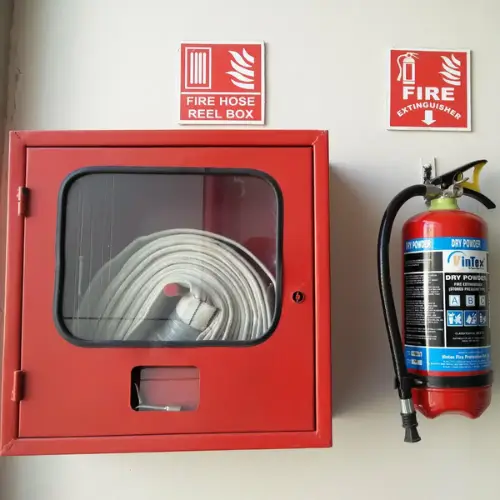 Mounted fire hose reel box and extinguisher on a safety wall for fire protection – Rajvar Technologies.
