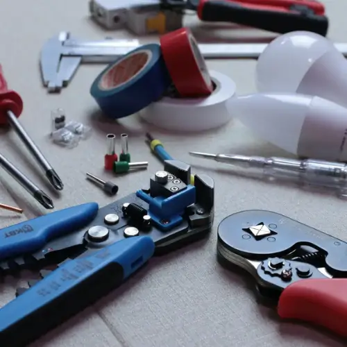 Electrical tools and wiring accessories arranged for professional installation services – Rajvar Technologies.